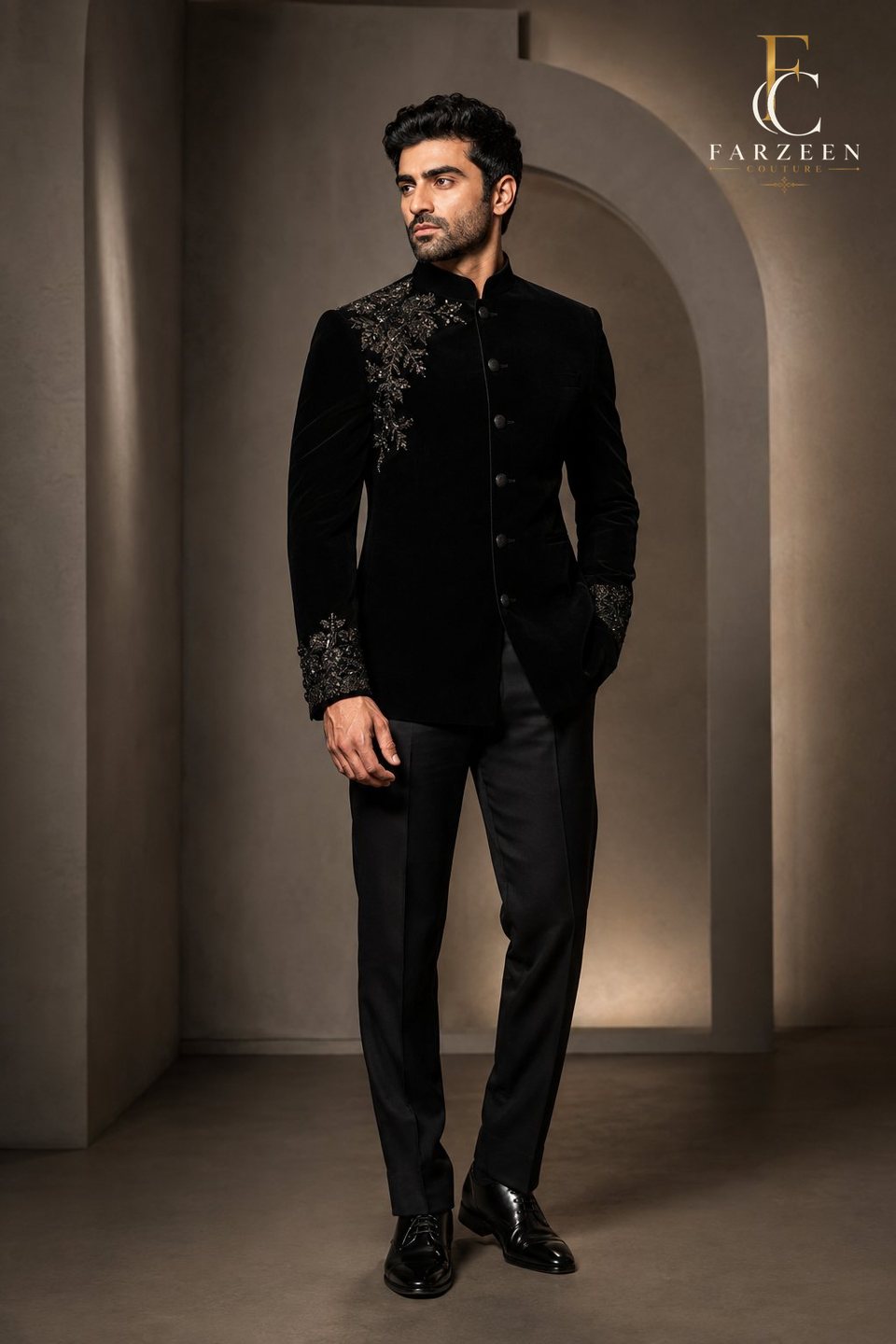 Man in a black velvet bandhgala with gunmetal beadwork and black trousers