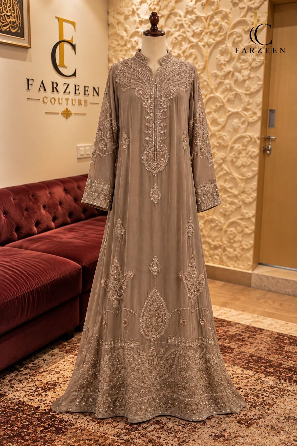Taupe embroidered kaftan with mandarin collar on a mannequin at the Farzeen Couture atelier